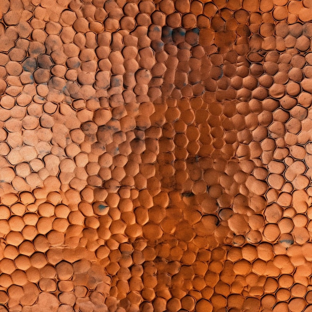 A close up of a brick wall with the texture of the bricks.