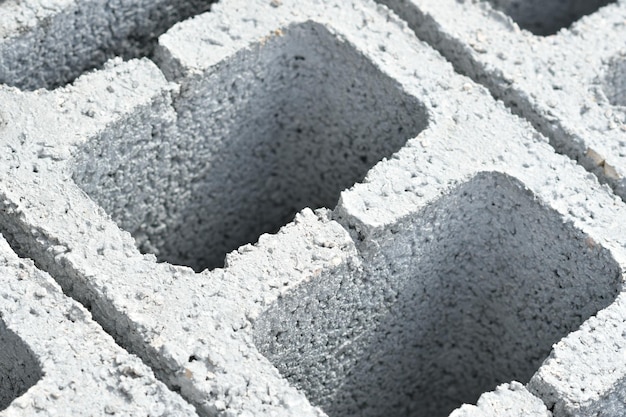 A close up of a brick with the word concrete on it