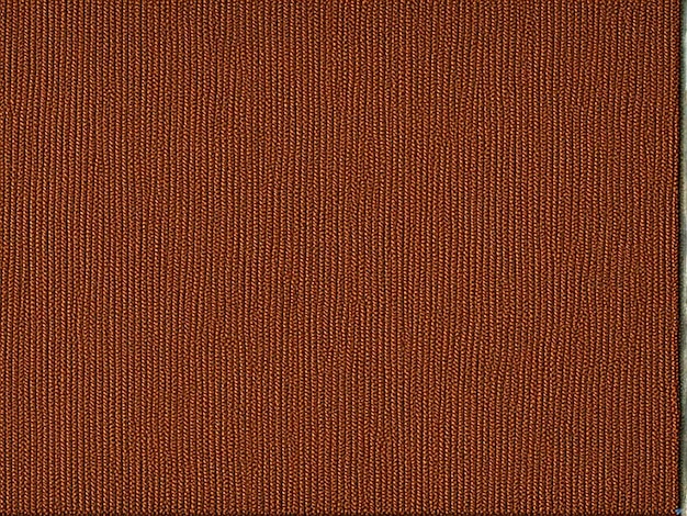 a close up of a brown leather textured wallpaper with a brown leather band