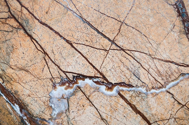 Close up of brown stone textured background.