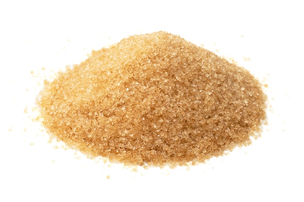 Close up of Brown sugar on a white background Natural cane sugar