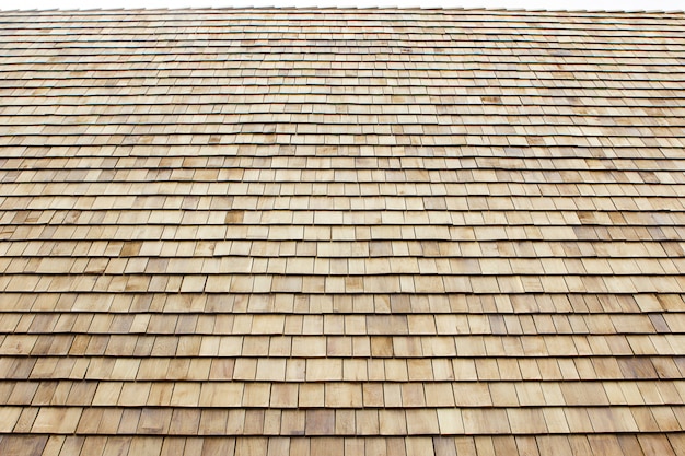 Close up of brown wood roof shingles.Wood background.