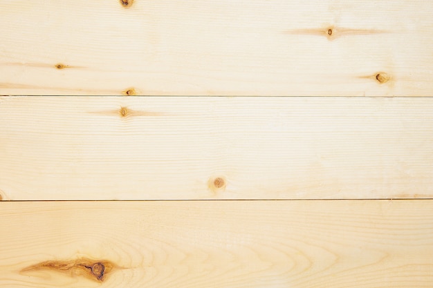 Foto chiuda sugli ambiti di provenienza marroni di struttura delle plance di legno