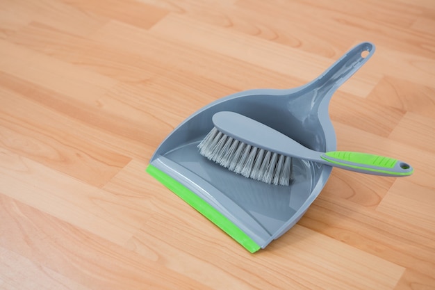 Close up of brush on dustpan