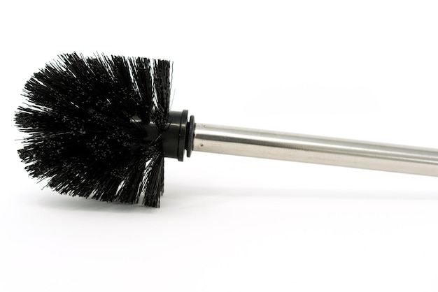 Photo close-up of brush over white background