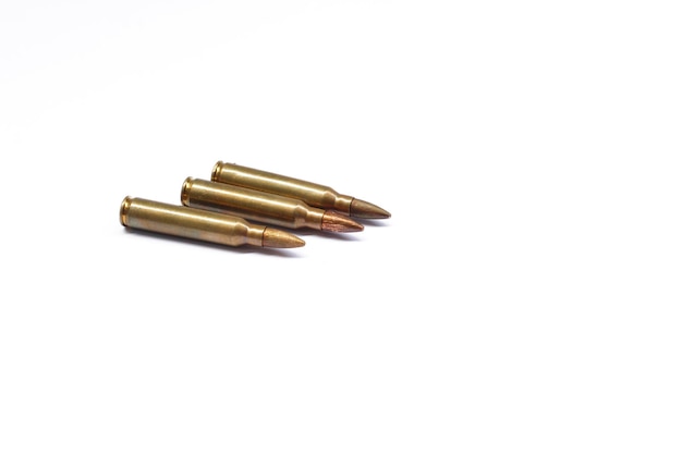 Photo close-up of bullets on white background