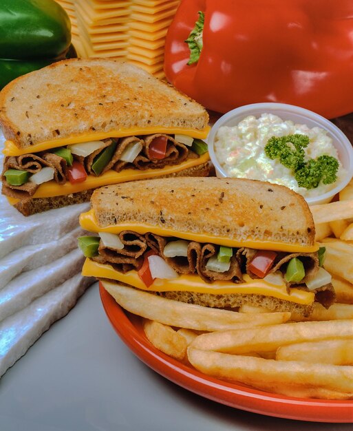 Photo close-up of burger in plate on table