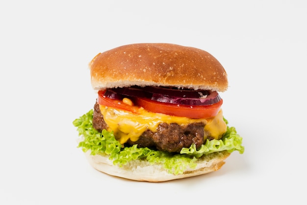 Close-up of burger on white table