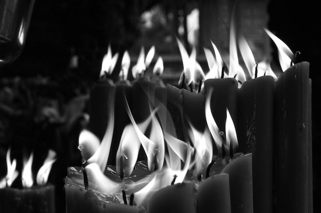 Close-up of burning candles