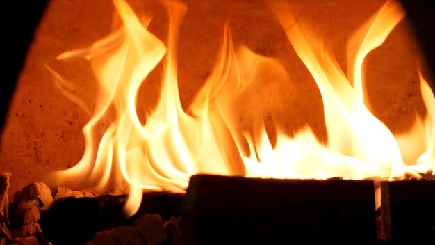 Close up for burning fire in old fashioned oven for baking food frame traditional oven burning woods