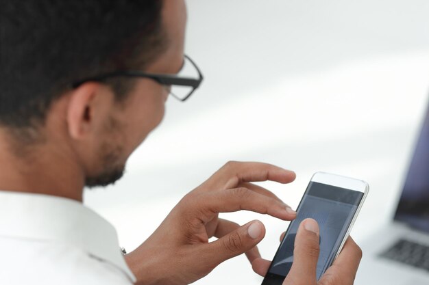 Close up business men using a modern smartphone