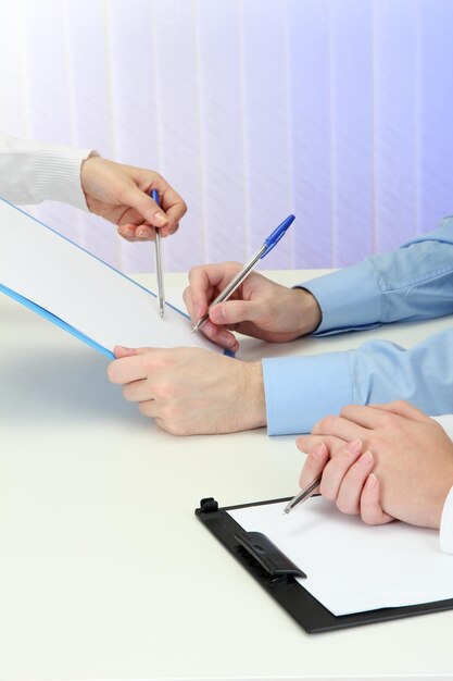 Close up of business people hands during teamwork