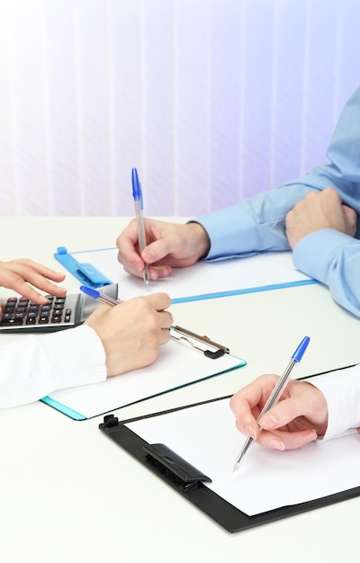 Close up of business people hands during teamwork