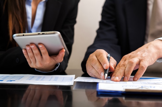 Close-up of business people at work