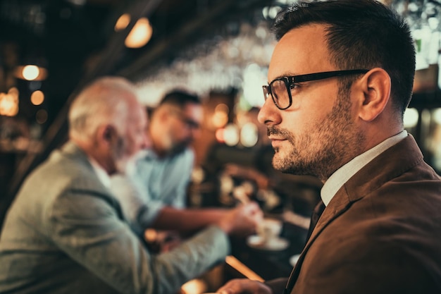 Close up of businessman at the bar