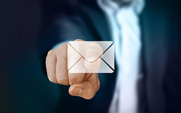 Close up of businessman hand pressing email icon button on touch screen interface