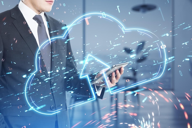 Close up of businessman hand using cellphone with glowing cloud with arrow on blurry office interior background Database and server concept Double exposure