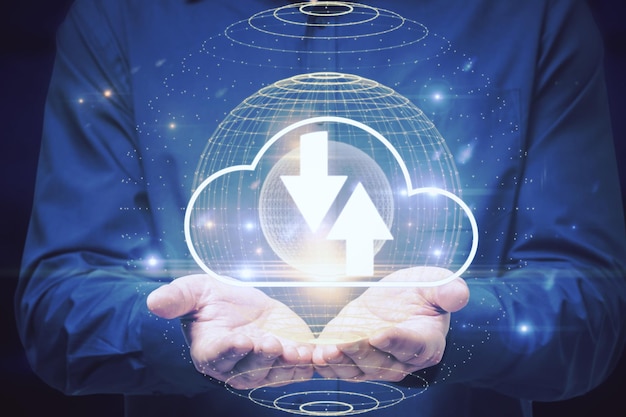 Close up of businessman hands holding abstract cloud hologram with arrows computing data upload and download concept double exposure