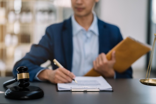 Close up businessman or Lawyer signing contract making a deal classic business at office in the morning