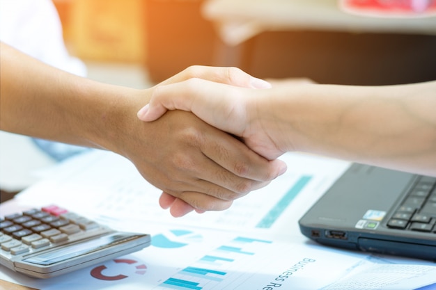 close-up of businessman making handshake.