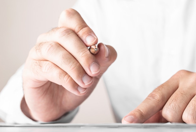 Close up businessman signing contract making a deal, business concept