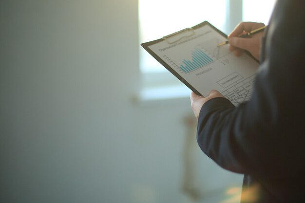 Close up.businessman studies a financial document.photo with copy space