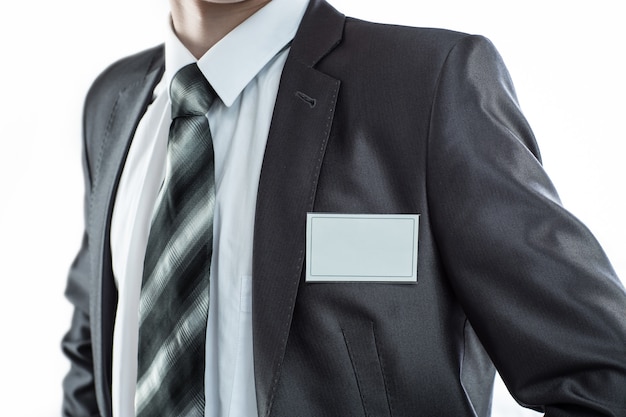 Close up on businessman with blank badge 