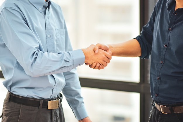 Close up of businessmen handshake