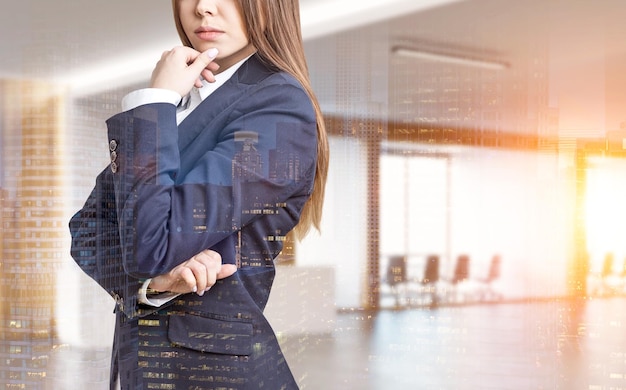 Close up of a businesswoman in a suit. She is standing in an office with conference room and thinking with her fingers on the chin. 3d rendering. Mock up. Toned image. Double exposure