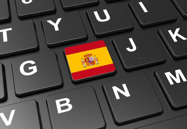 Close up of button with Spain flag on black keyboard