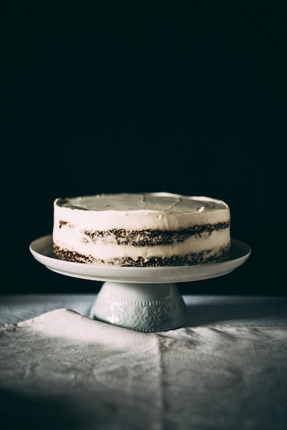 close-up of cake against black background