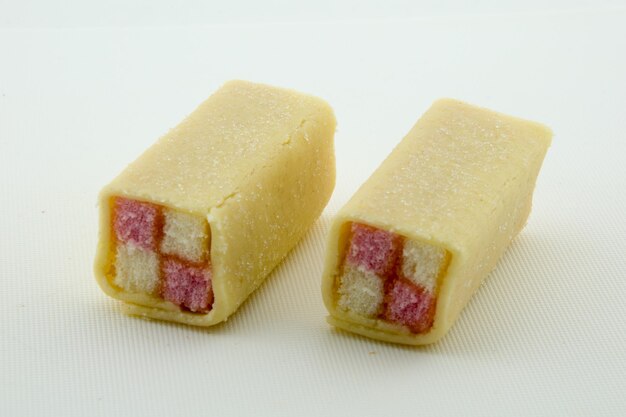 Close-up of cake against white background