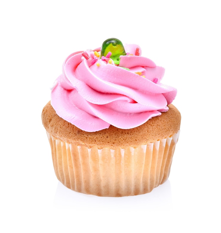 Photo close-up of cake against white background