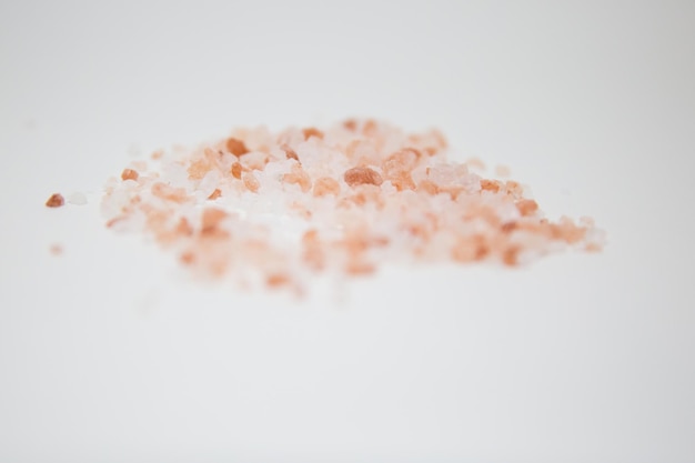 Photo close-up of cake against white background