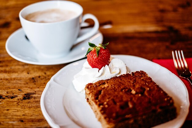 Close-up of cake served on table