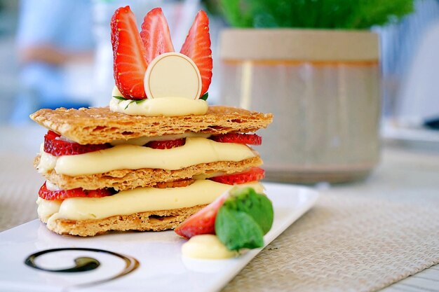 Close-up of cake served on table