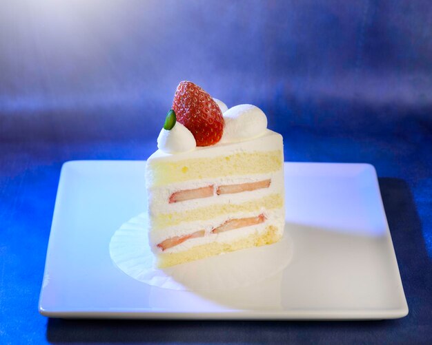 Close-up of cake served on table