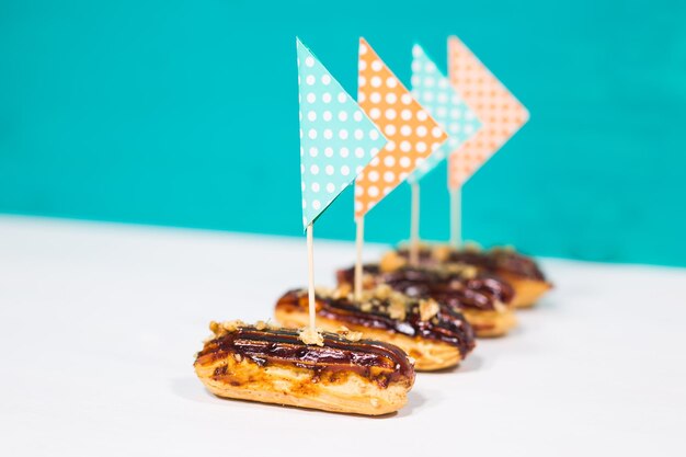 Close-up of cake on table against white background