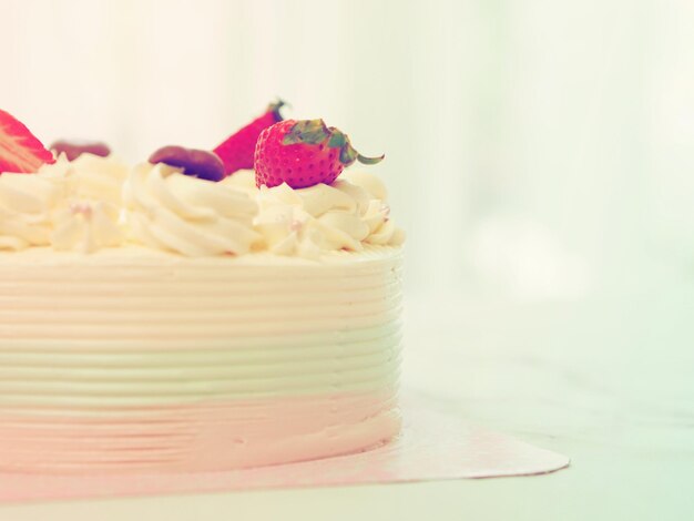 Photo close-up of cake on table