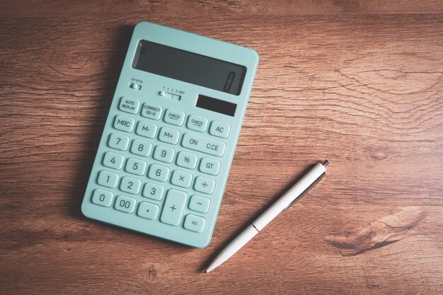 Close up calculator and financial report accounting concept