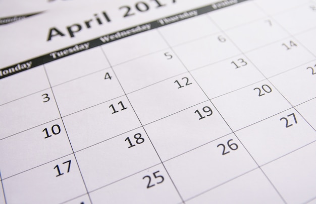 Close up calendar of page April background, Tax season