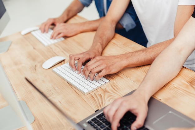 Close up call center staff communicating with customers online