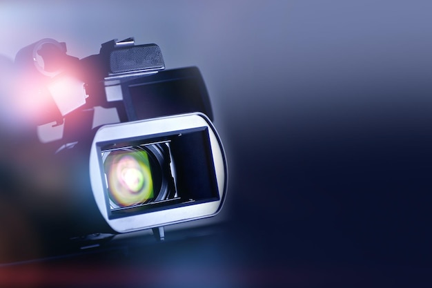 Photo close-up of camera against black background