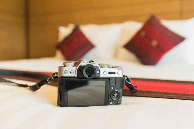 Close-up of camera on bed