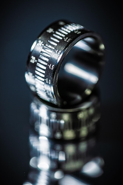 Close-up of camera lens on table