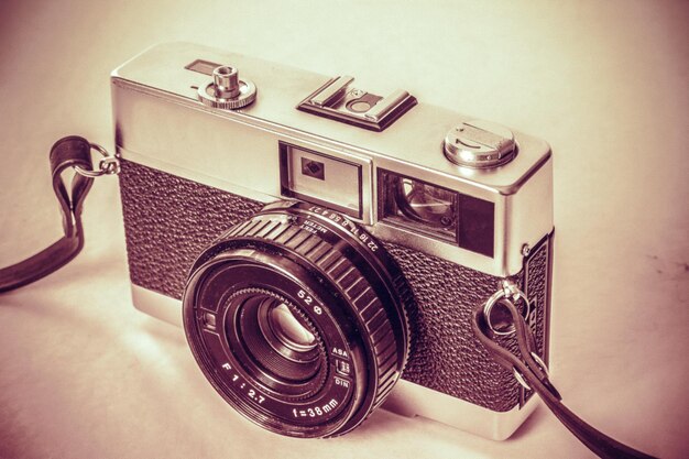 Close-up of camera on table