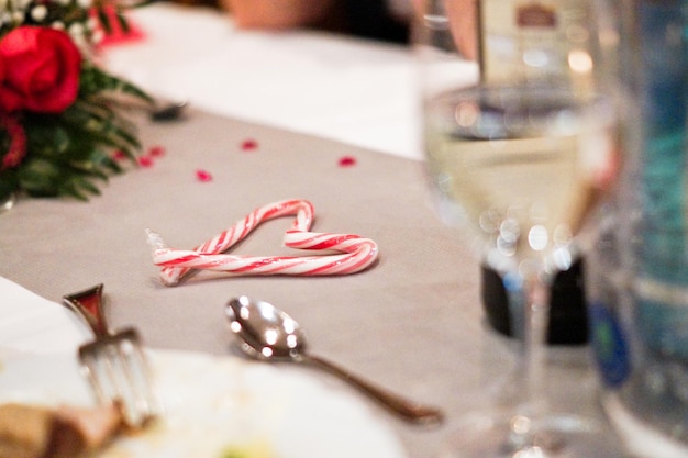 Close-up of candy cane on table