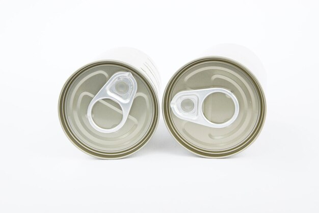 Photo close-up of cans on white background