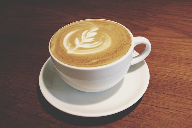 Close-up of cappuccino on table