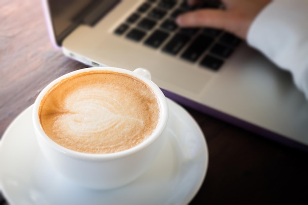 Close-up of cappuccino on table